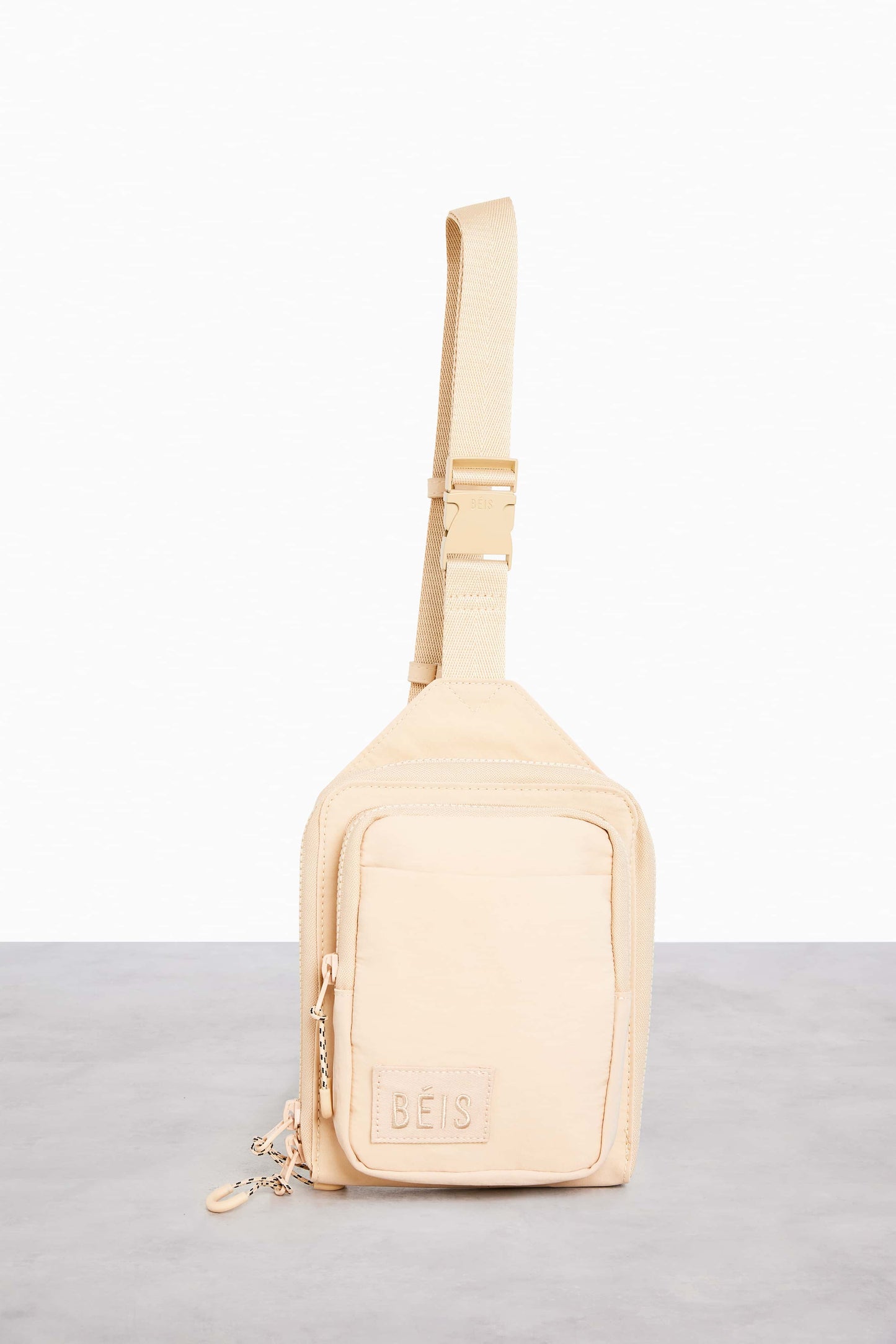 Le harnais de sport en beige