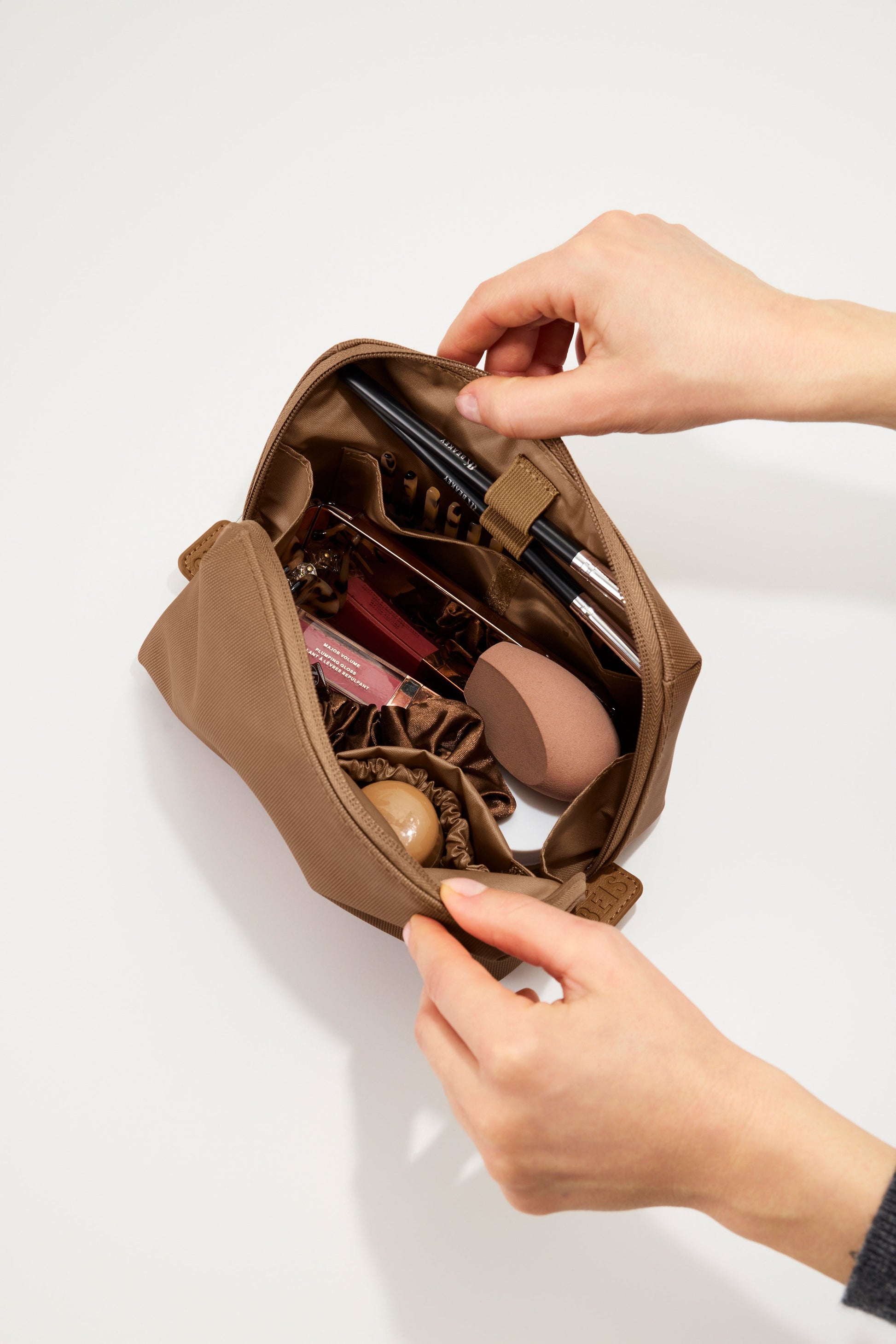 beis makeup travel bag BIS 'The Cosmetic Case' in Beige Its clear (literally) BIS 'The Small Cosmetic Pouch'