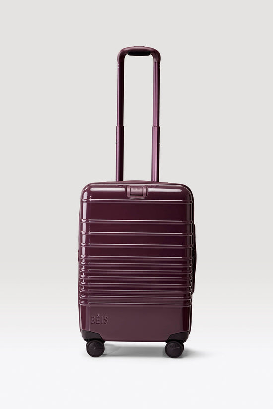 The Carry-On Roller in Glossy Plum