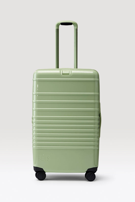 The Medium Check-In Roller in Glossy Mint