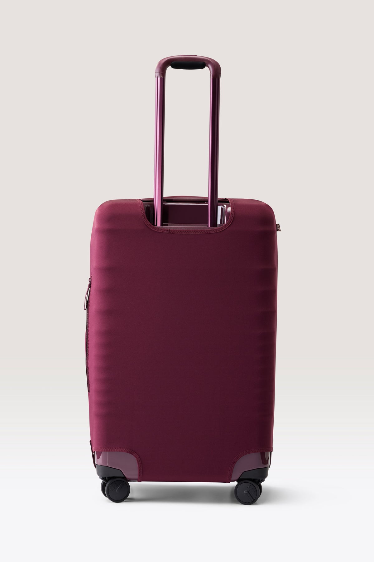 The Medium Check-In Luggage Cover in Plum