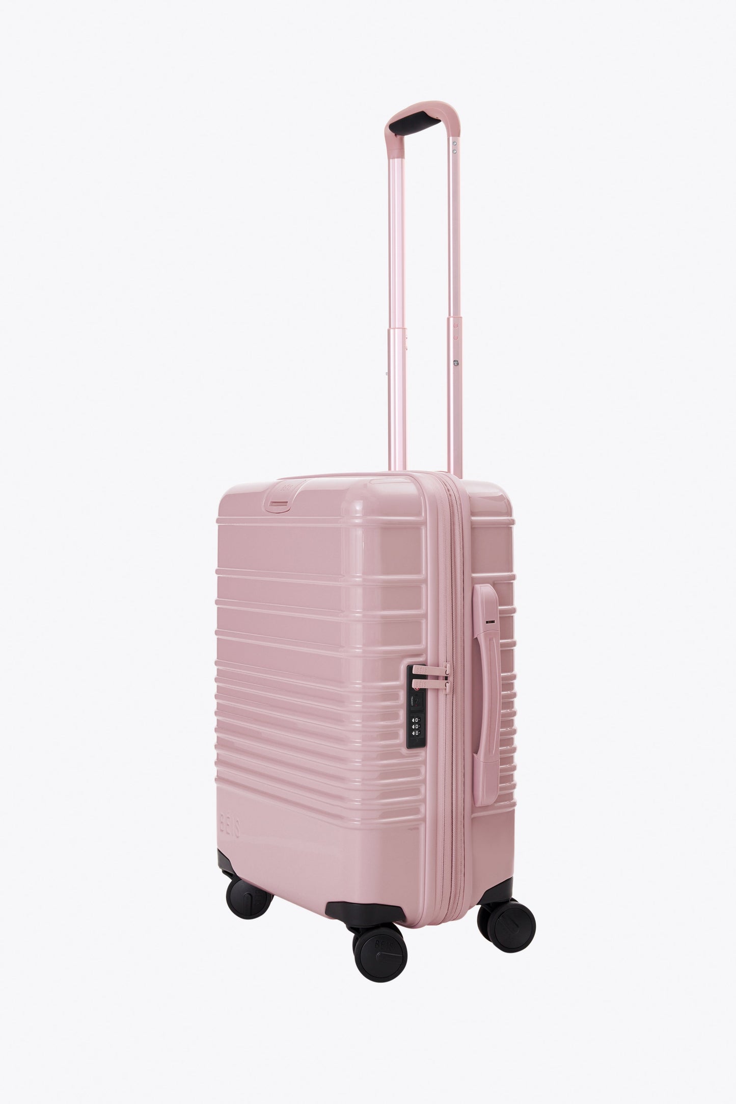 The Carry-On Roller in Glossy Atlas Pink