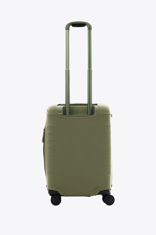 Le couvre-bagages de cabine en olive
