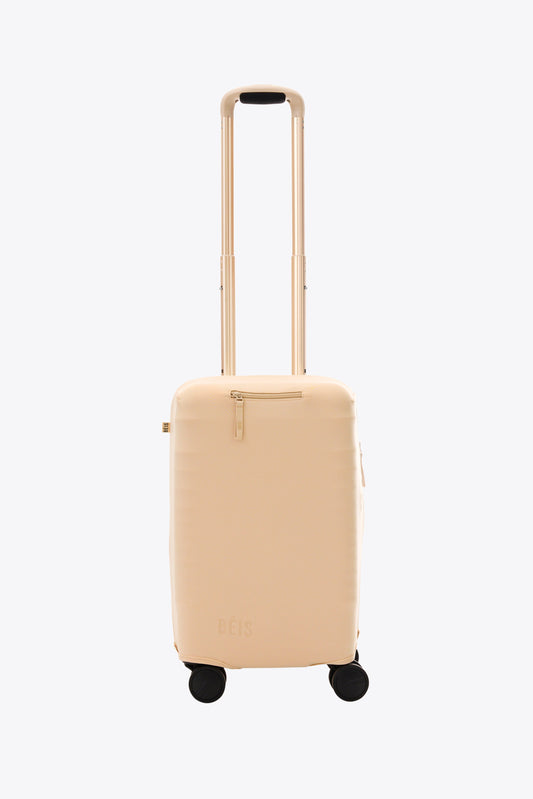 Le petit couvre-bagages de cabine en beige