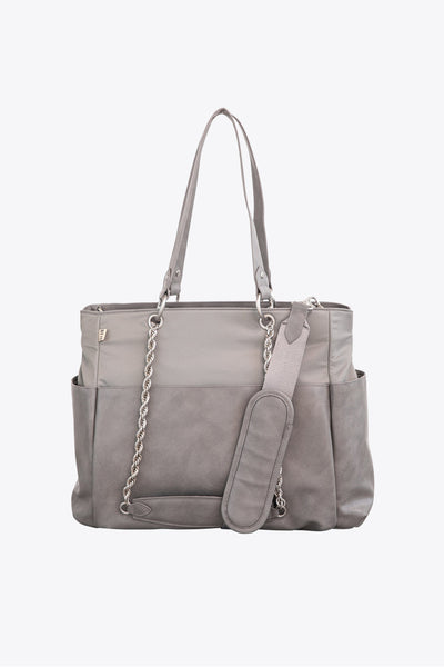 Le sac langer en gris Beis Travel