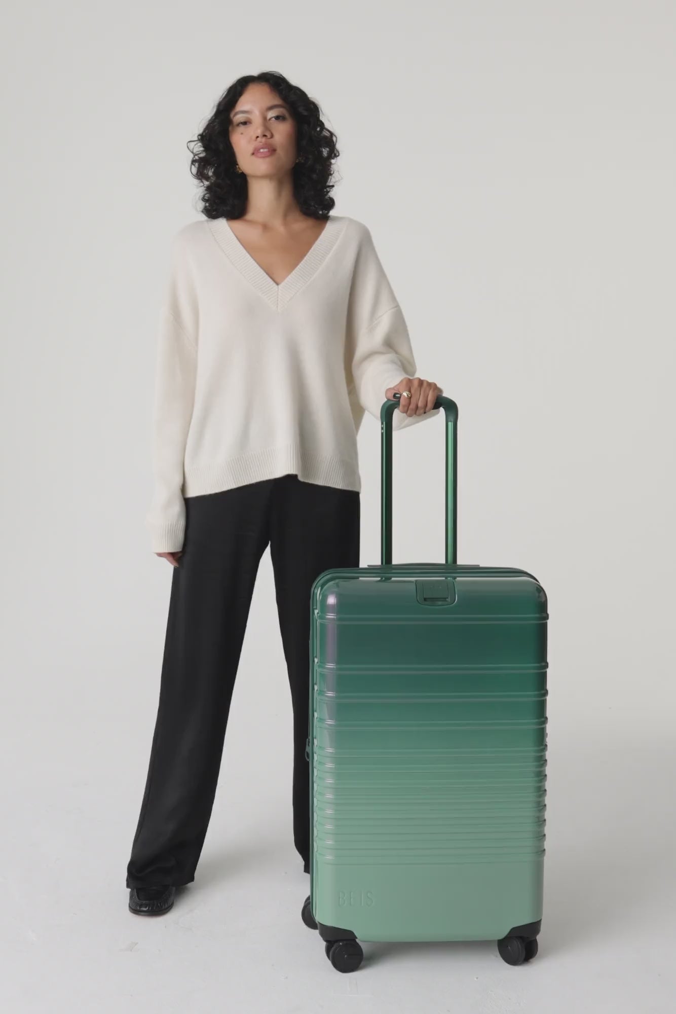 Medium rolling suitcase on sale