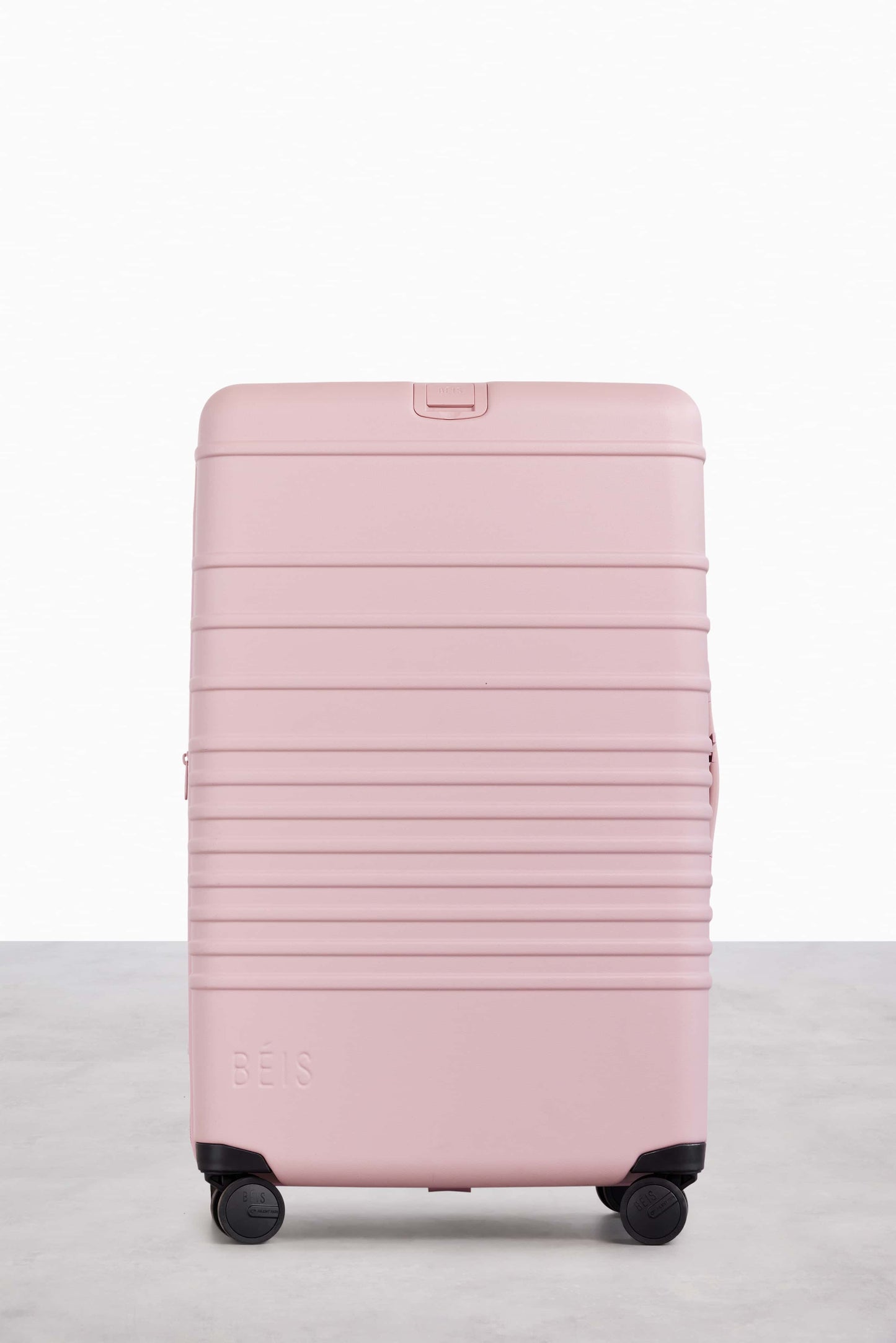 The 29" Large Check-In Roller in Atlas Pink