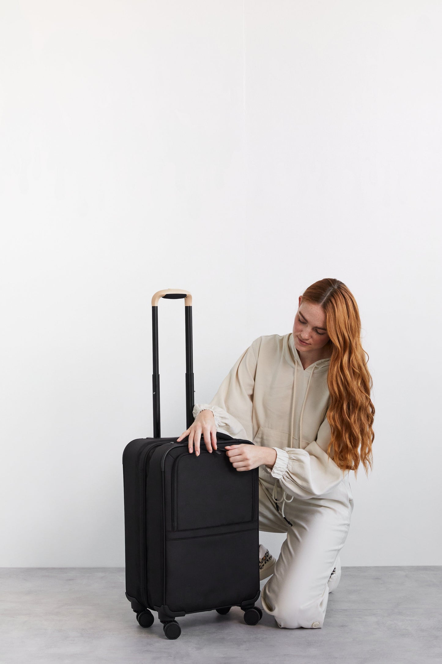 Soft-Sided Collapsible Carry-On Roller in Black