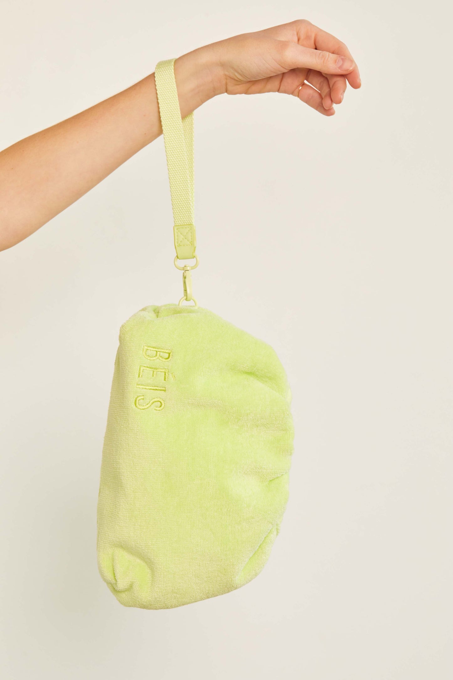 The Terry Cosmetic Clutch in Citron