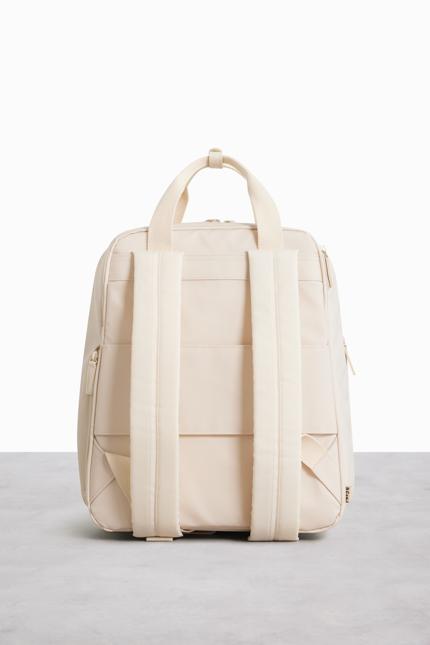 The Expandable Backpack in Beige