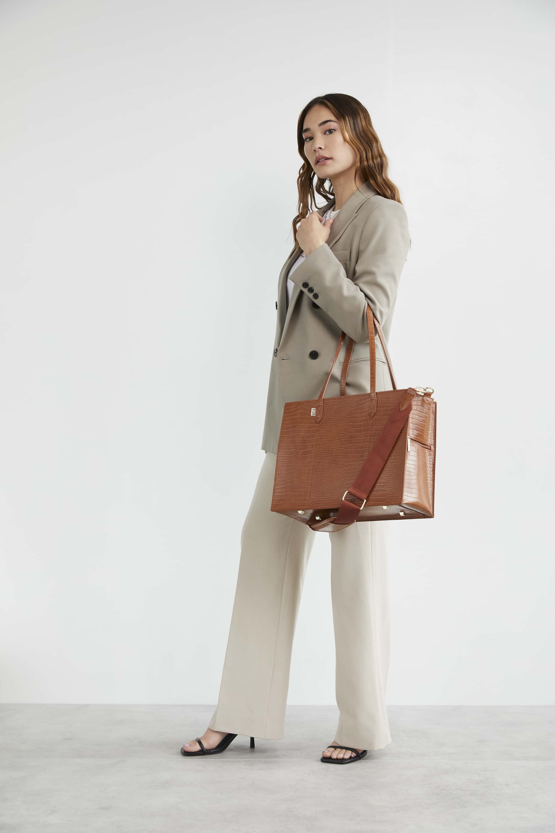 Mini Work Tote in Cognac Croc Front with Model using Handles