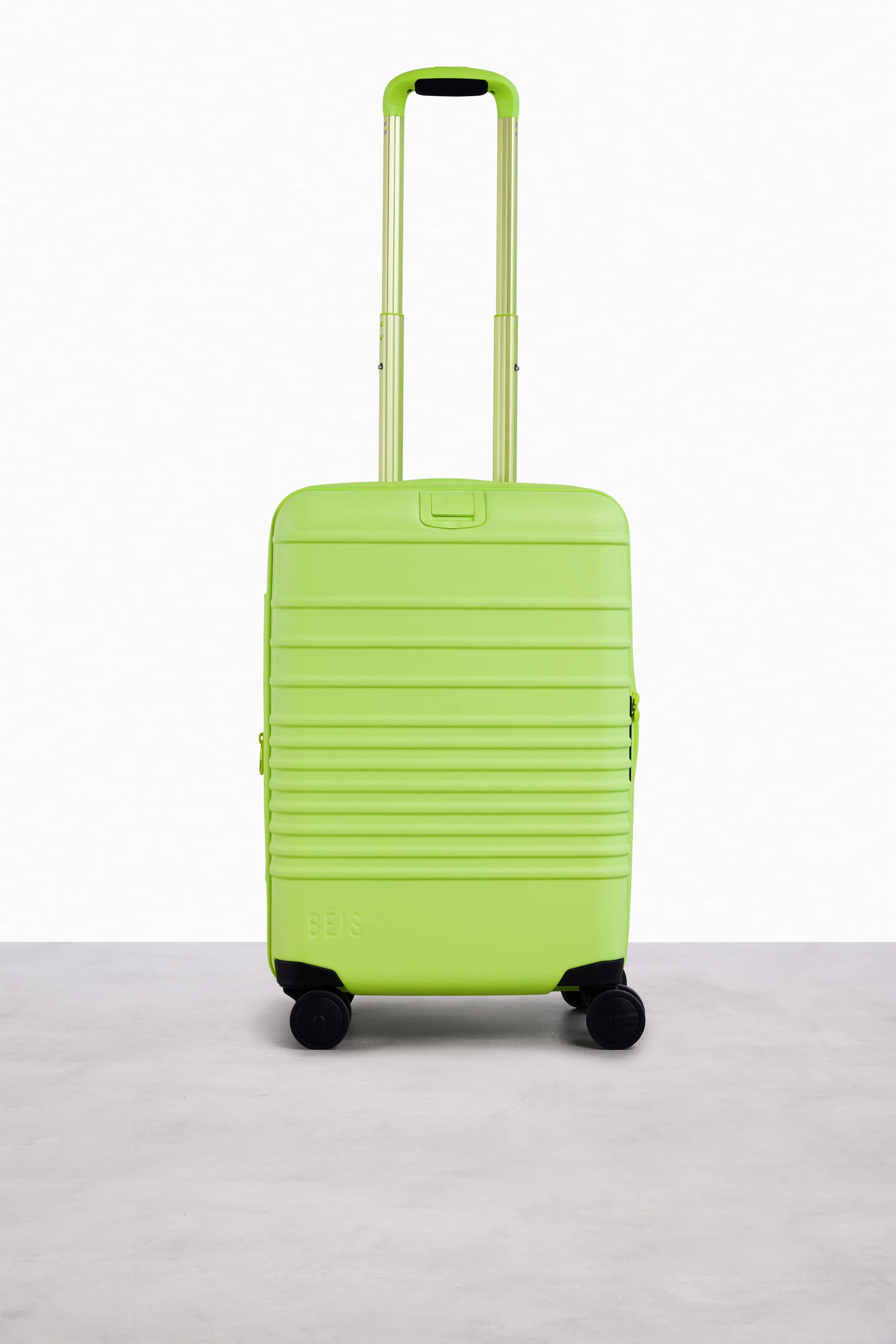 Green carry store on luggage