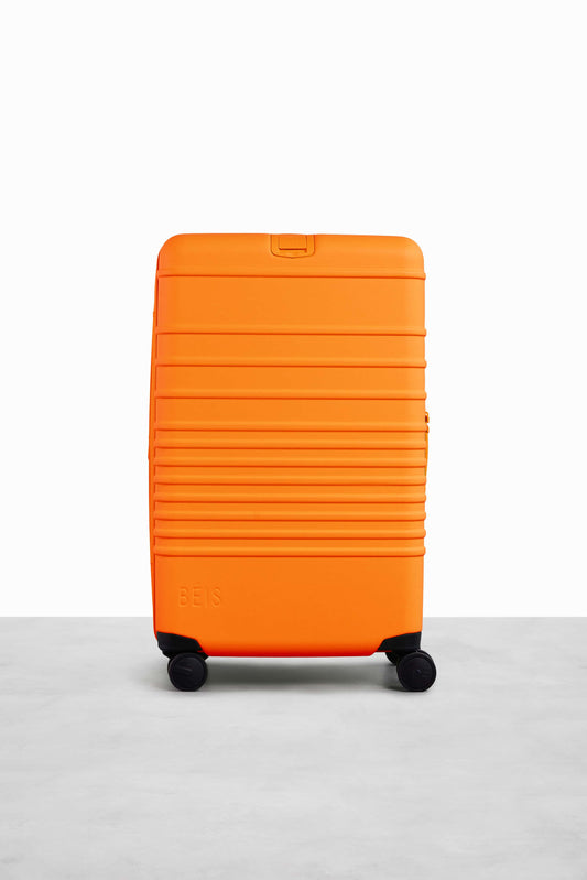 The Medium Check-In Roller in Creamsicle