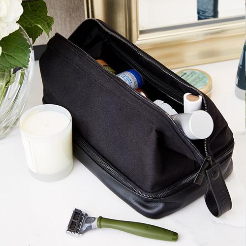 beis travel toiletry bag The Large Cosmetic Pouch in Black proof case so every makeup The Toiletry Bag in Black
