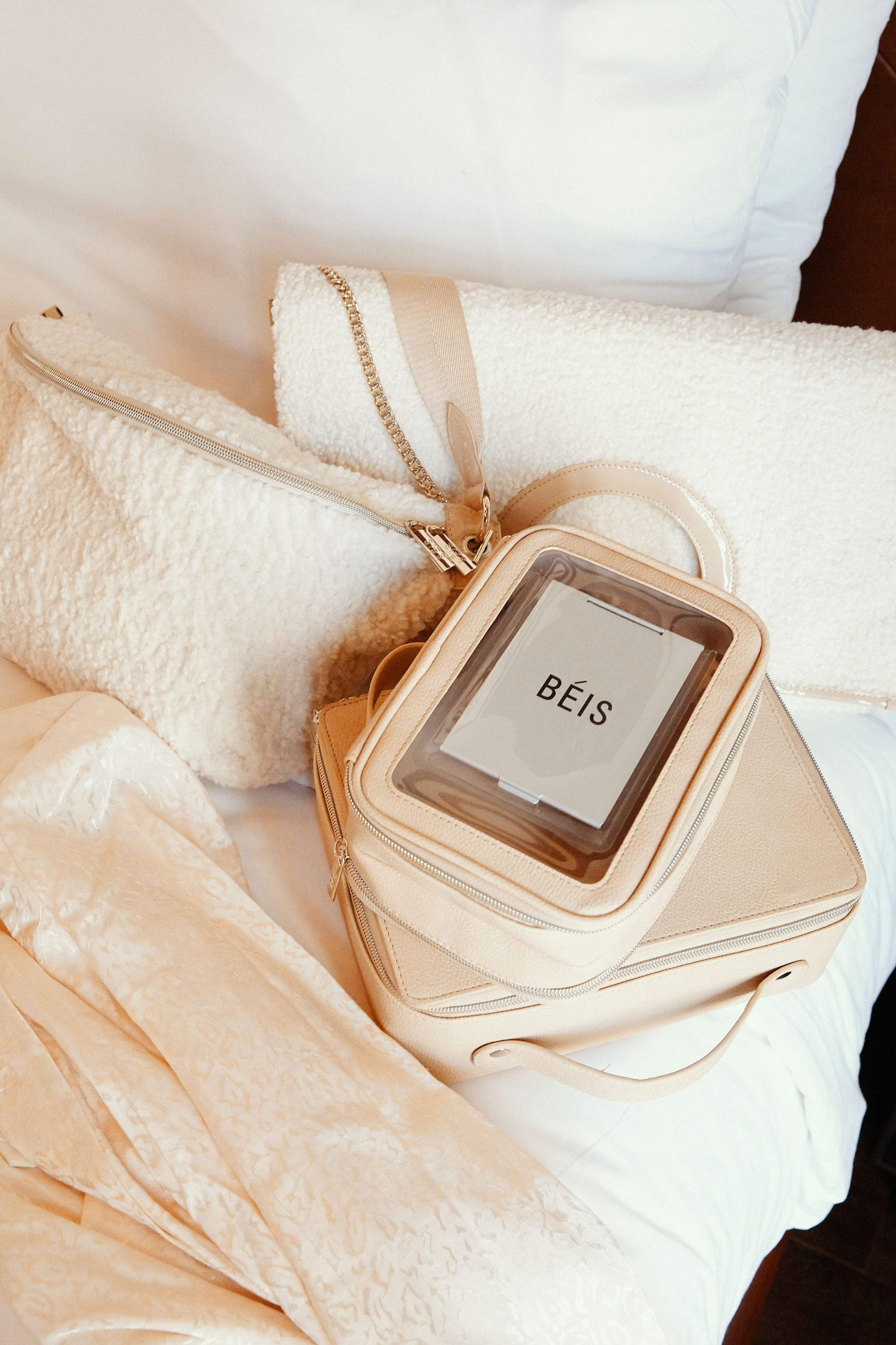 BEIS by Shay Mitchell | The On-The-Go Essential case in Beige on bed