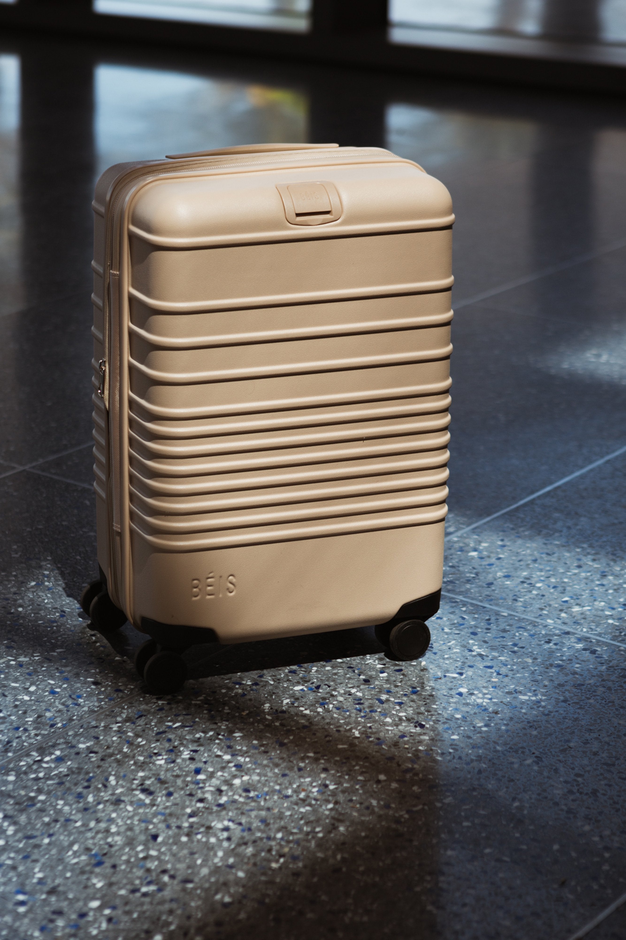 Beige luggage online